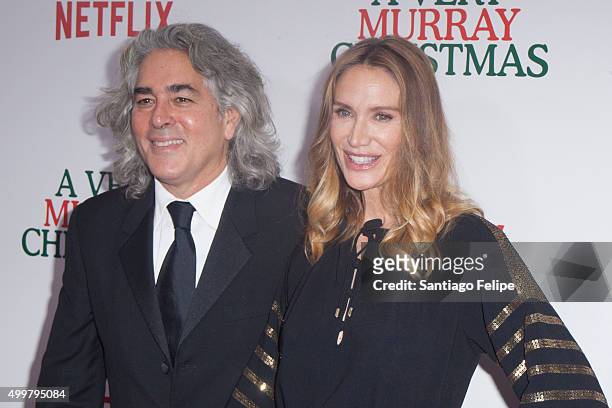Mitch Glazer and Kelly Lynch attend "A Very Murray Christmas" New York Premiere at Paris Theater on December 2, 2015 in New York City.