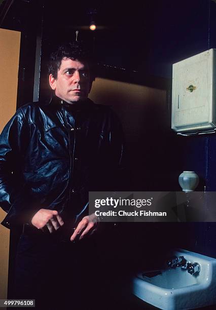 Portrait of American musician Lou Reed backstage at the Bottom Line nightclub, New York, New York, 1983.
