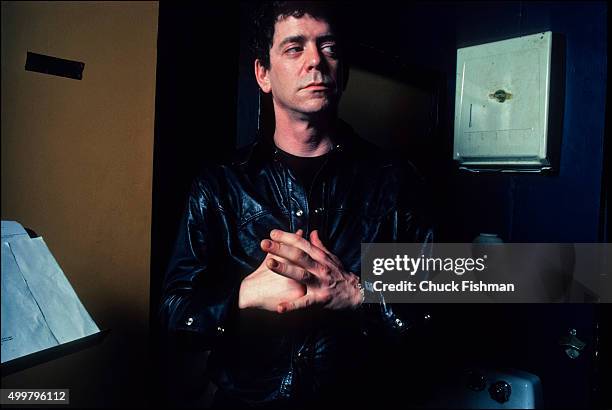 Portrait of American musician Lou Reed backstage at the Bottom Line nightclub, New York, New York, 1983.