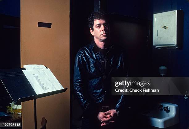 Portrait of American musician Lou Reed backstage at the Bottom Line nightclub, New York, New York, 1983.