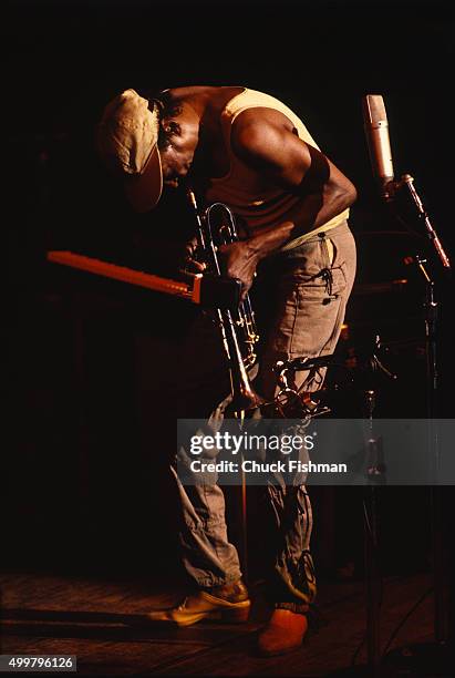 American Jazz musician Miles Davis plays trumpet as he performs onstage, New York, New York, July 1981.