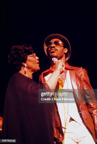 American Jazz and Pop musicians Ella Fitzgerald and Stevie Wonder onstage together at the New Orleans Jazz Festival, New Orleans, Louisiana, 1977.