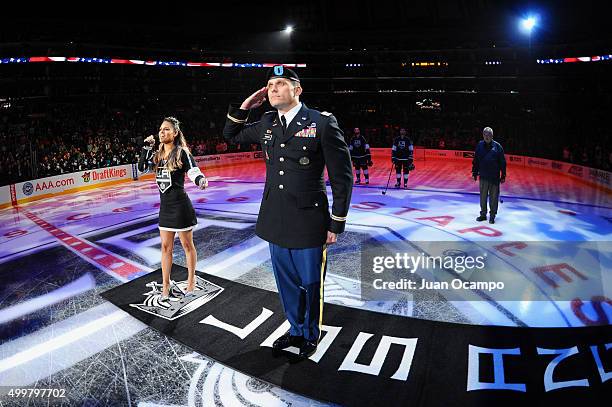 Pia Toscano sings the national anthem prior to the game between the Los Angeles Kings and the New York Islanders on November 12, 2015 at Staples...