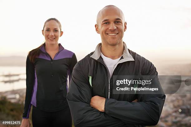 fitness is just around the corner - pro athlete stock pictures, royalty-free photos & images