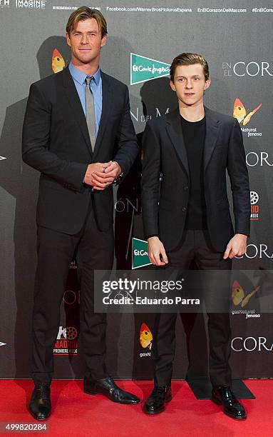 Actors Chris Hemsworth and Tom Holland attend 'En el corazon del mar' premiere at Callao cinema on December 3, 2015 in Madrid, Spain.