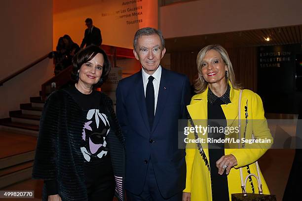 Sophie Desmarais, Bernard Arnault and Helene Mercier attend the 'Volez, Voguez, Voyagez - Louis Vuitton' Exhibition Opening at Le Grand Palais on...