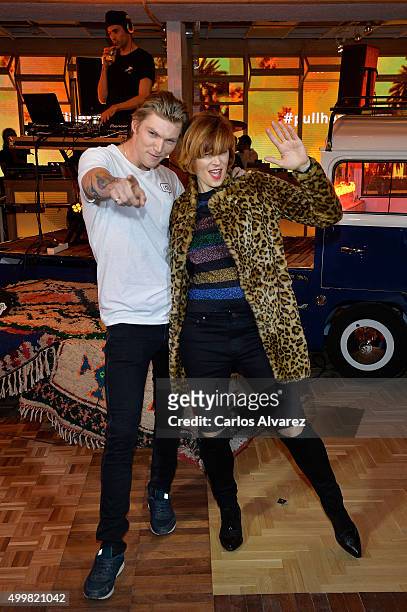 Model Bimba Bose and Charlie Centa attend the Pull & Bear biggest Store opening on December 3, 2015 in Madrid, Spain.