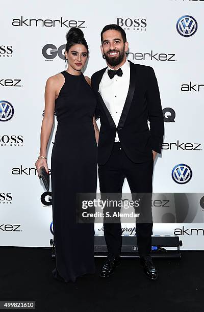 Arda Turan and a guest attend the GQ Men of the Year Awards at Four Season Bosphorus Hotel on December 3, 2015 in Istanbul, Turkey.