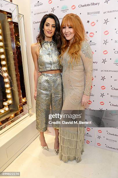 Amal Clooney and Charlotte Tilbury attend Charlotte Tilbury's naughty Christmas party celebrating the launch of Charlotte's new flagship beauty...