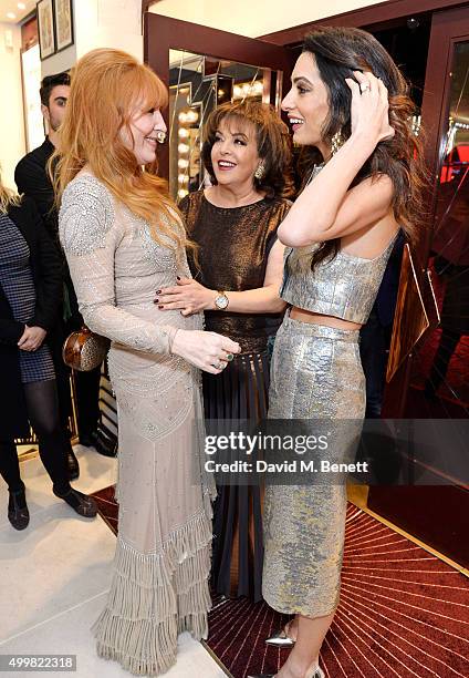 Charlotte Tilbury, Baria Alamuddin and Amal Clooney attend Charlotte Tilbury's naughty Christmas party celebrating the launch of Charlotte's new...