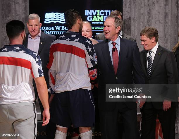 Former President George W. Bush greets Invictus aspiring Vollyball competitors during an event to announce a major initiative prior to the 2016...