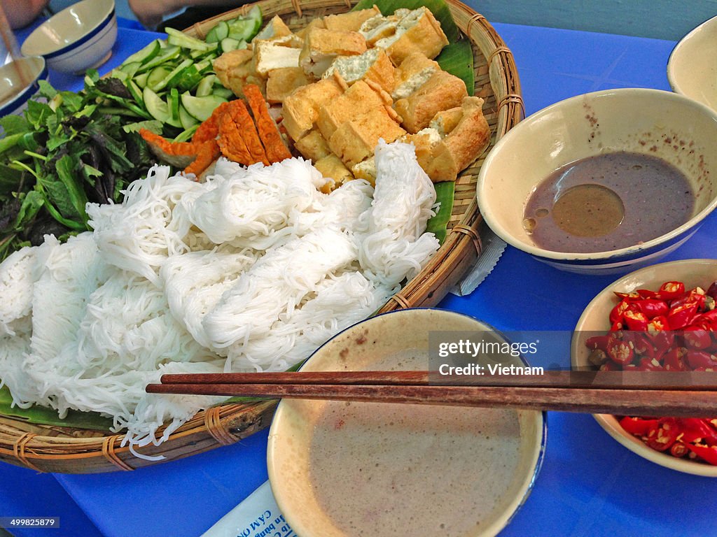 Rice noodles with fried tofu and mam tom