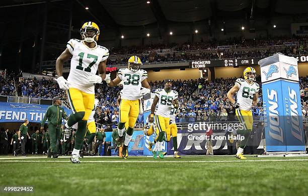 Davante Adams, John Crockett, James Jones and Jeff Janis of the Green Bay Packers enter the field prior to playing the Detroit Lions on December 3...