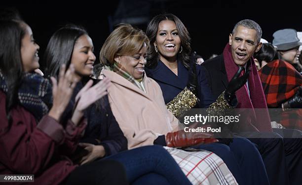 Malia Obama, Sasha Obama, mother-in-law Marian Robinson, first lady Michelle Obama and President Barack Obama attend the national Christmas tree...