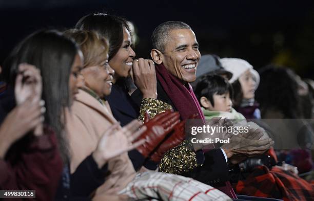 Malia Obama, Sasha Obama, mother-in-law Marian Robinson, first lady Michelle Obama and President Barack Obama attend the national Christmas tree...