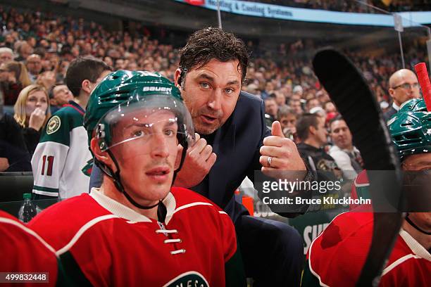 Minnesota Wild assistant coach Andrew Brunette talks with Ryan Carter during the game against the Toronto Maple Leafs on December 3, 2015 at the Xcel...