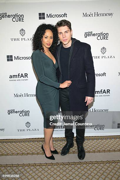 Actress Margot Bingham and Actor Nolan Gerard Funk attends 2015 amfAR generationCURE Holiday Party at Oak Room on December 3, 2015 in New York City.