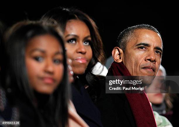 First Lady Michelle Obama and U.S. President Barack Obama attend the 93rd Annual National Christmas Tree Lighting at The Ellipse on December 3, 2015...