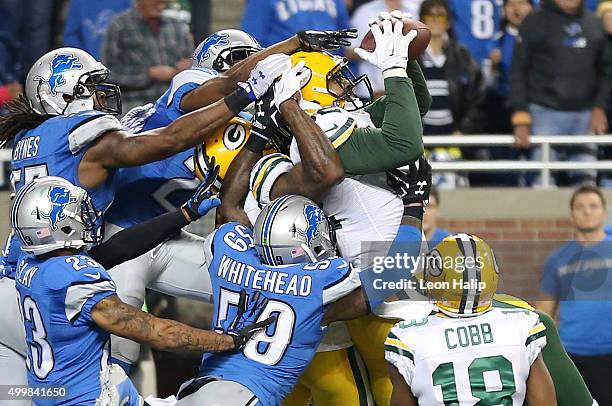 Richard Rodgers of the Green Bay Packers catches a fourth quarter touchdown to win the game 27-23 over the Detroit Lions on December 3 2015 at Ford...