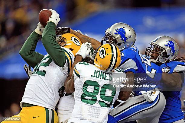 Tight end Richard Rodgers of the Green Bay Packers catches the game-winning touchdown as time expired to defeat the Detroit Lions 27-23 at Ford Field...