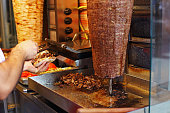 Cook Preparing a Turkish Doner Kebab
