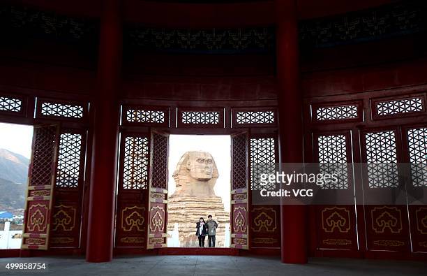 Building with half Chinese temple and half western architecture and a replica of Sphinx are seen in a new studio park on December 3, 2015 in...