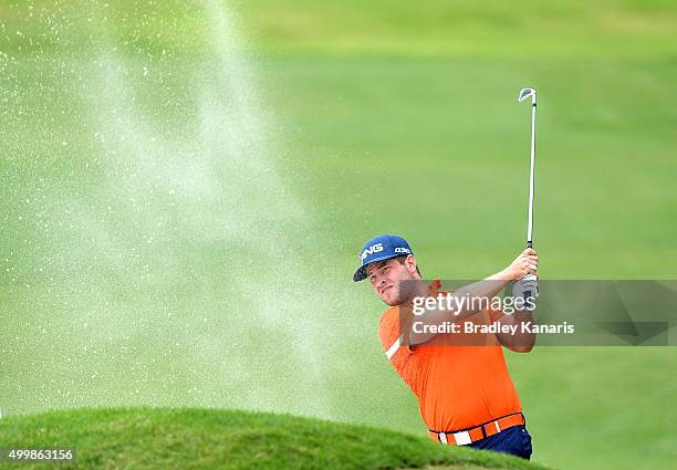 David Lingmerth of Sweden plays a shot out of the bunker on the 13th hole during day two of the 2015 Australian PGA Championship at Royal Pines...