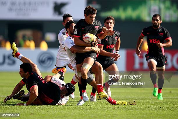 Santiago Alvarez of Argentina in action against Japan during the Emirates Dubai Rugby Sevens - HSBC Sevens World Series on December 4, 2015 in Dubai,...