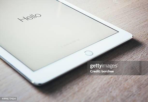 new ipad air 2 silver - apple computers stock pictures, royalty-free photos & images