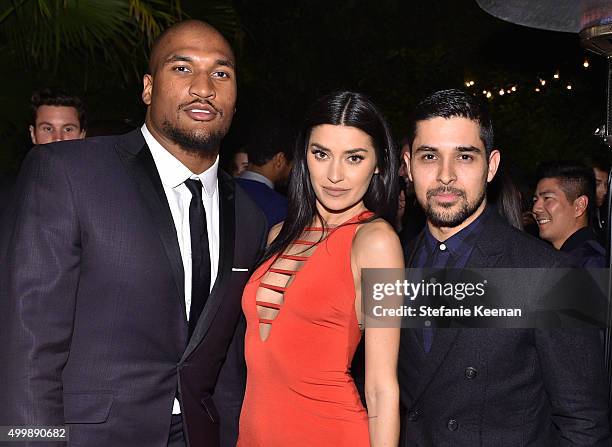 Professional football player Larry English, TV personality Nicole Williams, and actor Wilmer Valderrama attend the GQ 20th Anniversary Men of the...