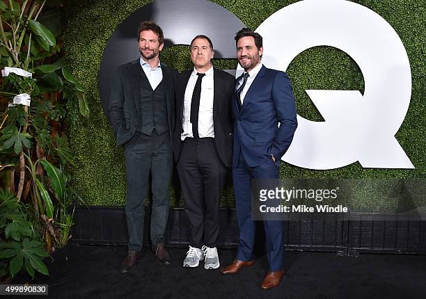 Actor Bradley Cooper, director David O. Russell and actor Edgar Ramirez attend the GQ 20th Anniversary Men Of The Year Party at Chateau Marmont on...