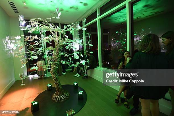 Guests attend the Raspoutine Paris Pop-Up At L'Eden By Perrier Jouet at Penthouse at the Faena Hotel Miami Beach on December 3, 2015 in Miami Beach,...