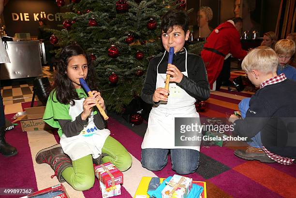 Children play during the World Childhood Foundation Baking at Hotel Vier Jahreszeiten on November 30, 2015 in Munich, Germany.