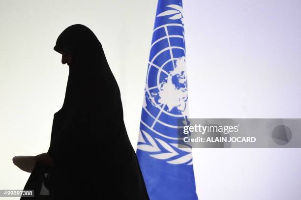 Iran's Vice President Masoumeh Ebtekar leaves after delivering a speech during the opening day of the World Climate Change Conference 2015 , on...