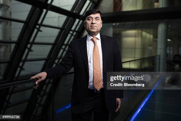 Rakesh Kapoor, chief executive officer of Reckitt Benckiser Group Plc, poses for a photograph following a Bloomberg Television interview in London,...