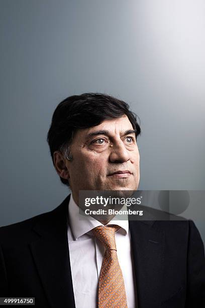 Rakesh Kapoor, chief executive officer of Reckitt Benckiser Group Plc, poses for a photograph following a Bloomberg Television interview in London,...