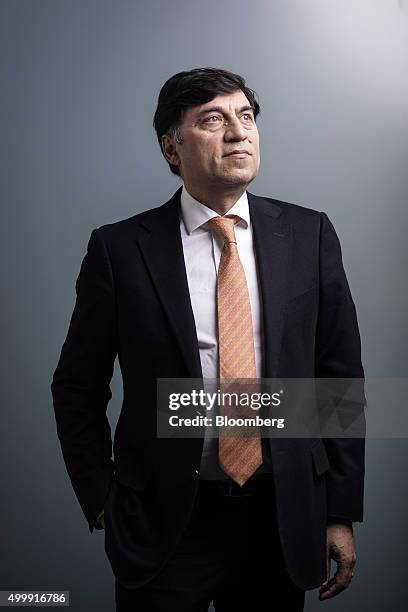 Rakesh Kapoor, chief executive officer of Reckitt Benckiser Group Plc, poses for a photograph following a Bloomberg Television interview in London,...