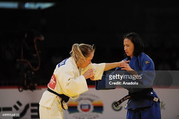 Turkish judoka Ebru Sahin in action against Russian judoka Natalia Kondratyeva in the women's 48-kilogram category final at the Judo Grand Slam Tokyo...