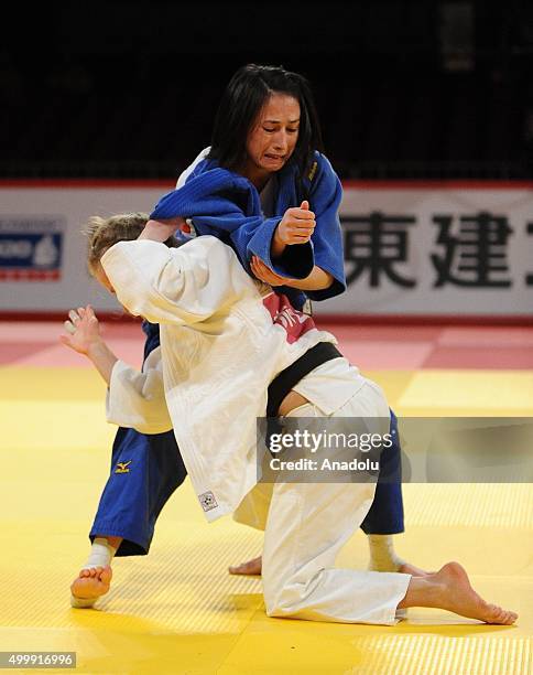 Turkish judoka Ebru Sahin in action against Russian judoka Natalia Kondratyeva in the women's 48-kilogram category final at the Judo Grand Slam Tokyo...