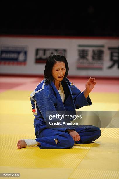 Turkish judoka Ebru Sahin gestures after getting injured during his fight against Russian judoka Natalia Kondratyeva in the women's 48-kilogram...