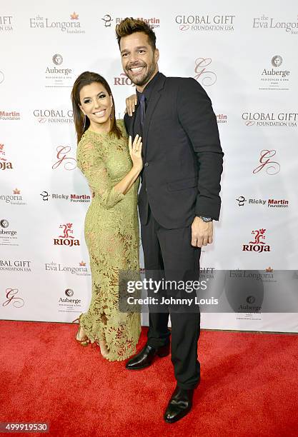 Eva Longoria and Ricky Martin attend the Global Gift Foundation Dinner at Auberge Residences & Spa sales office on December 3, 2015 in Miami, Florida.