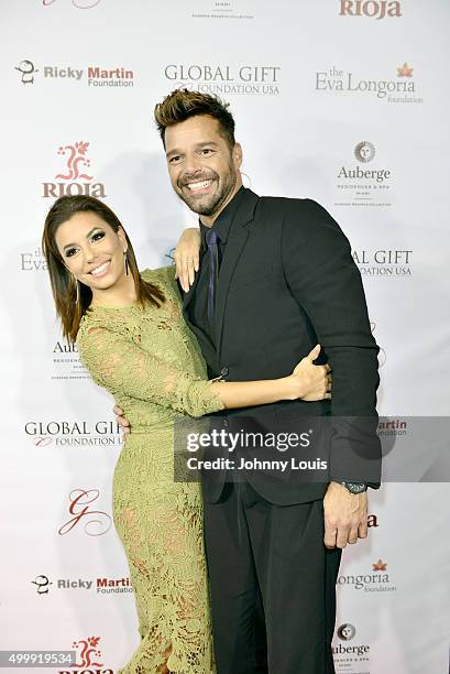 Eva Longoria and Ricky Martin attend the Global Gift Foundation Dinner at Auberge Residences & Spa sales office on December 3, 2015 in Miami, Florida.