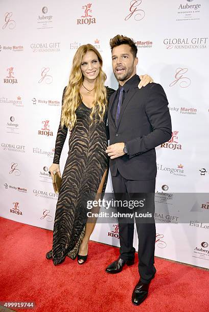 Esther Canadas and Ricky Martin attend the Global Gift Foundation Dinner at Auberge Residences & Spa sales office on December 3, 2015 in Miami,...