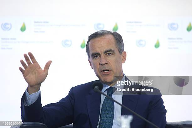 Mark Carney, governor of the Bank of England , gestures as he speaks during a news conference at the United Nations COP21 climate summit at Le...