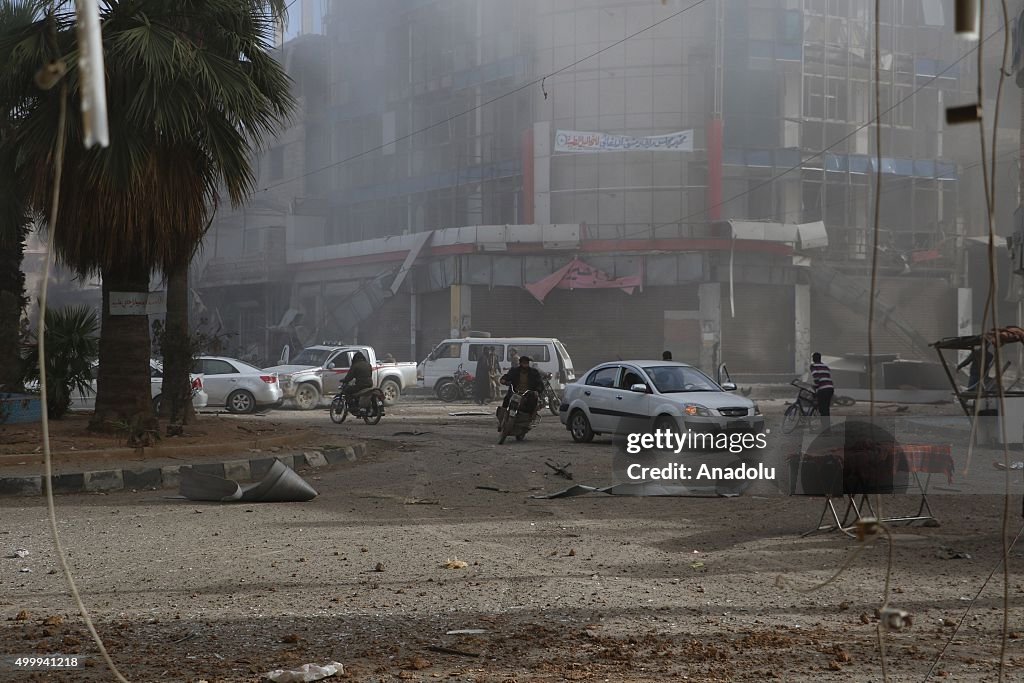 Syria The Fire Rises Smoke rises as Syrians run away from a fire which broke out after the ...
