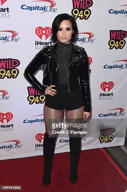 Singer Demi Lovato poses backstage during the 2015 WiLD 94.9's FM Jingle Ball at ORACLE Arena on December 3, 2015 in Oakland, California.