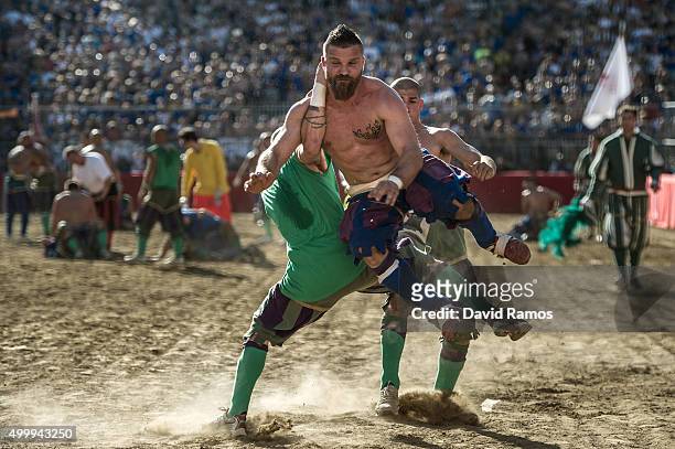 La Santa Croce Azzurri Team player Alessio Giorgerini duels for the ball during the semi-final match against the San Giovanni Verdi Team on June 16,...