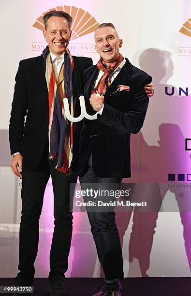 Richard E. Grant and Ed Burstell, winner of the Winq Business Award, attend the Winq Magazine Men of the Year lunch to benefit the Elton John Aids...