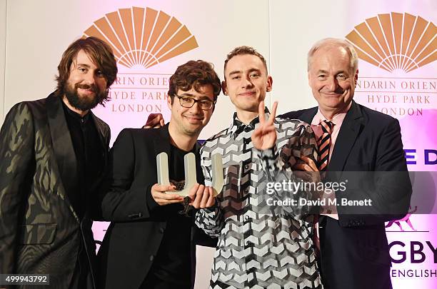 Mikey Goldsworthy, Emre Turkmen and Olly Alexander of Years & Years, winners of the Winq Music Award, and Paul Gambaccini attend the Winq Magazine...