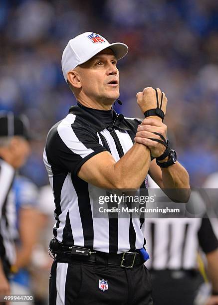 Official Clete Blakeman makes a holding call during the game between the Oakland Raiders and the Detroit Lions at Ford Field on November 22, 2015 in...